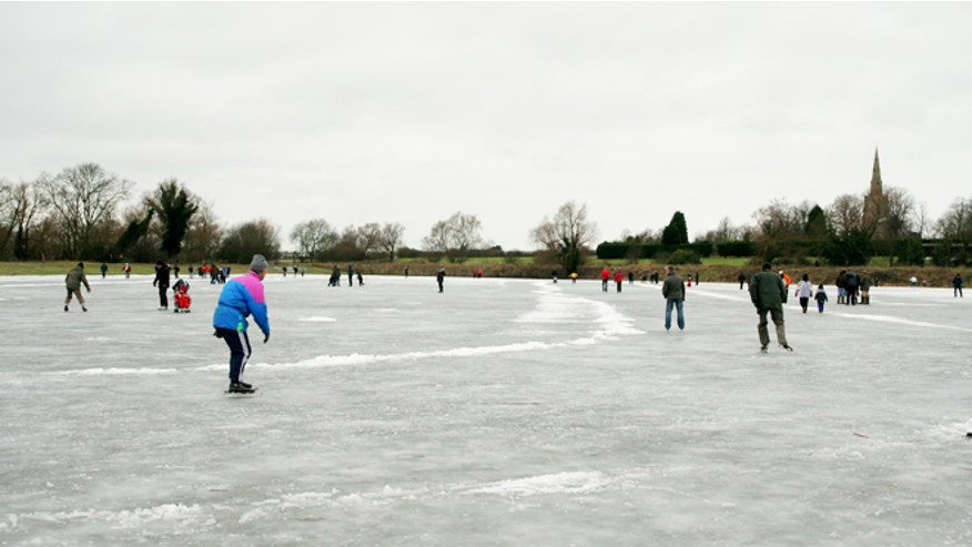 hockey skaters on pond.jpg